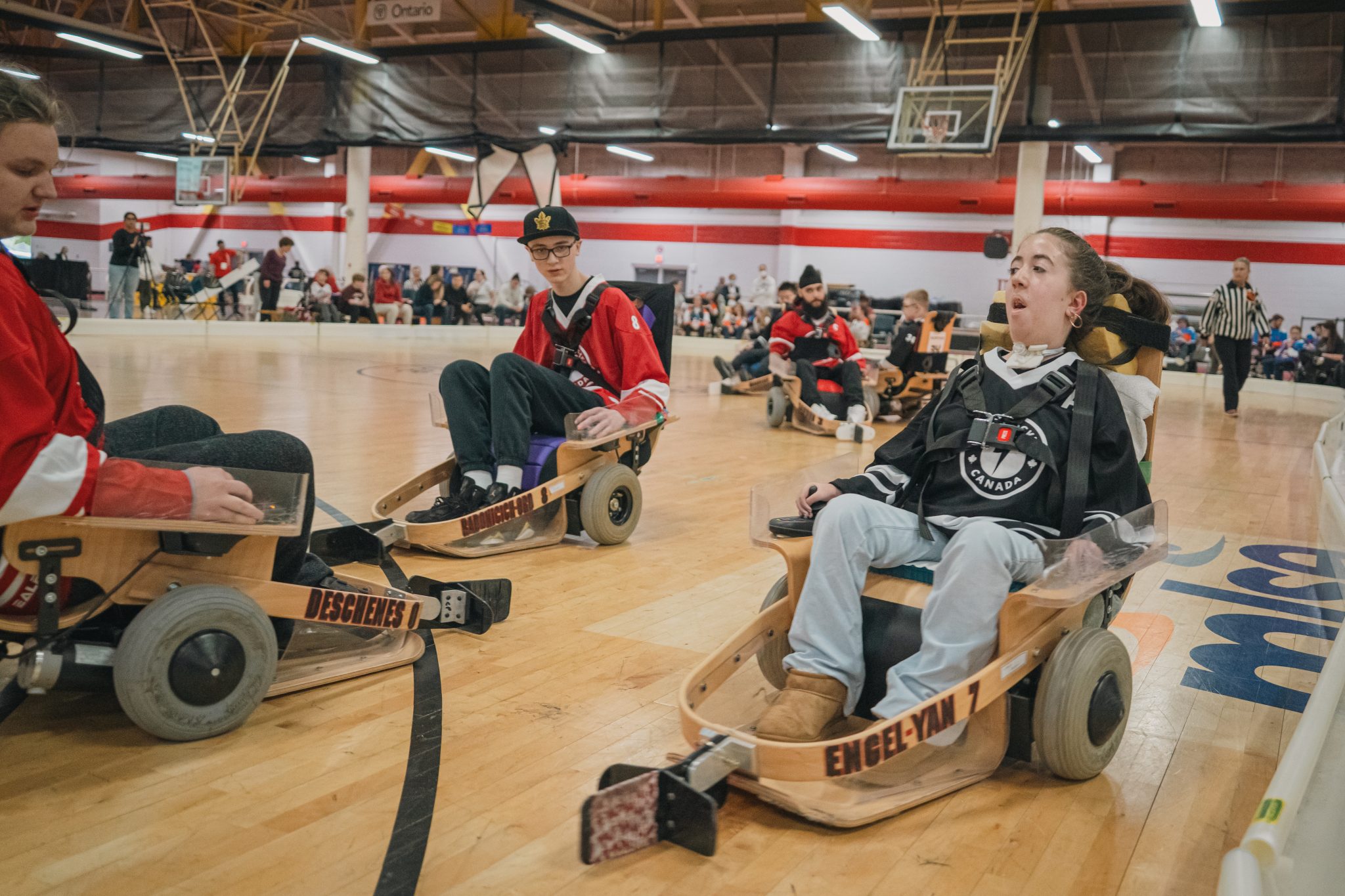VOLT Hockey athletes compete during a game on an indoor court.